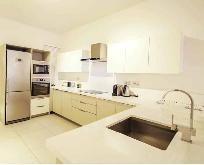 Cap Ouest Beachfront Residences Apartment *